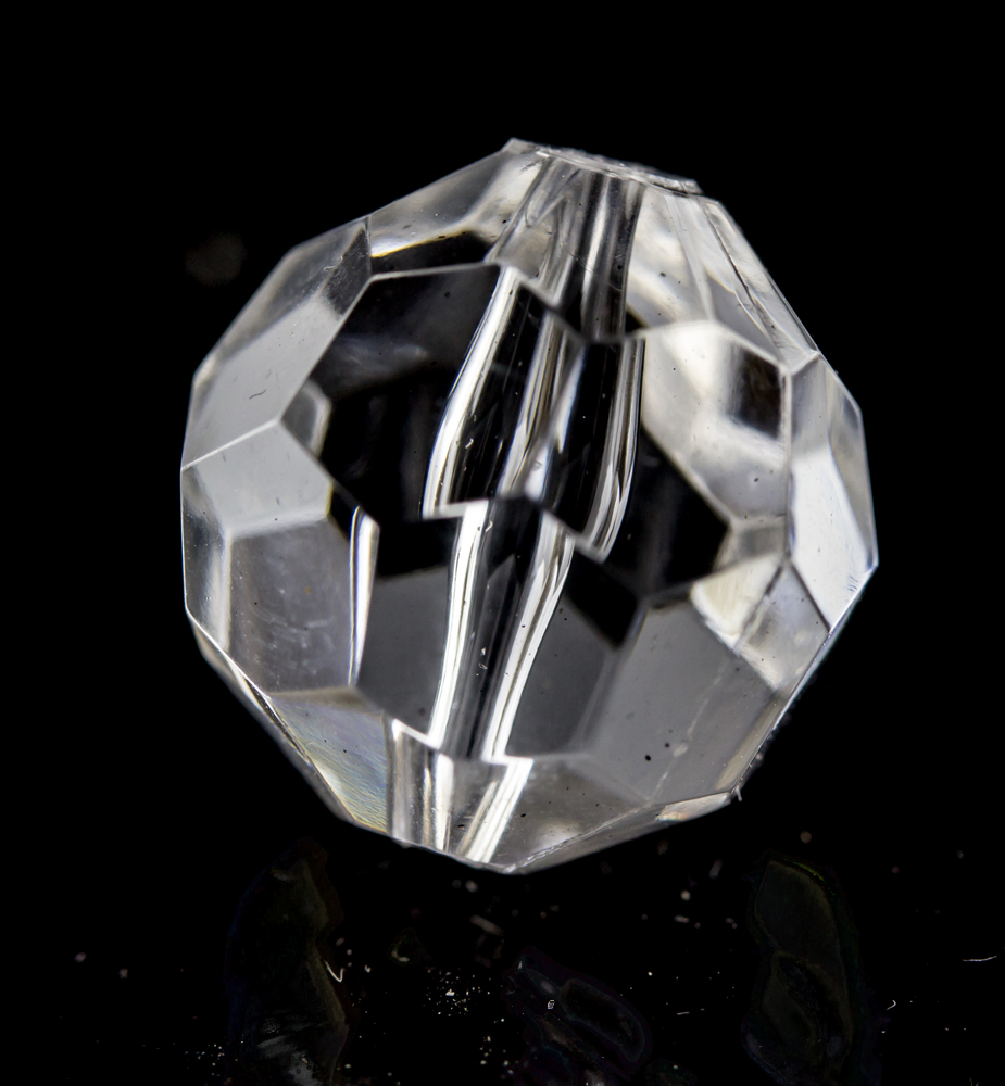 12mm  facettierte Rundperle in  glasklar Transparent