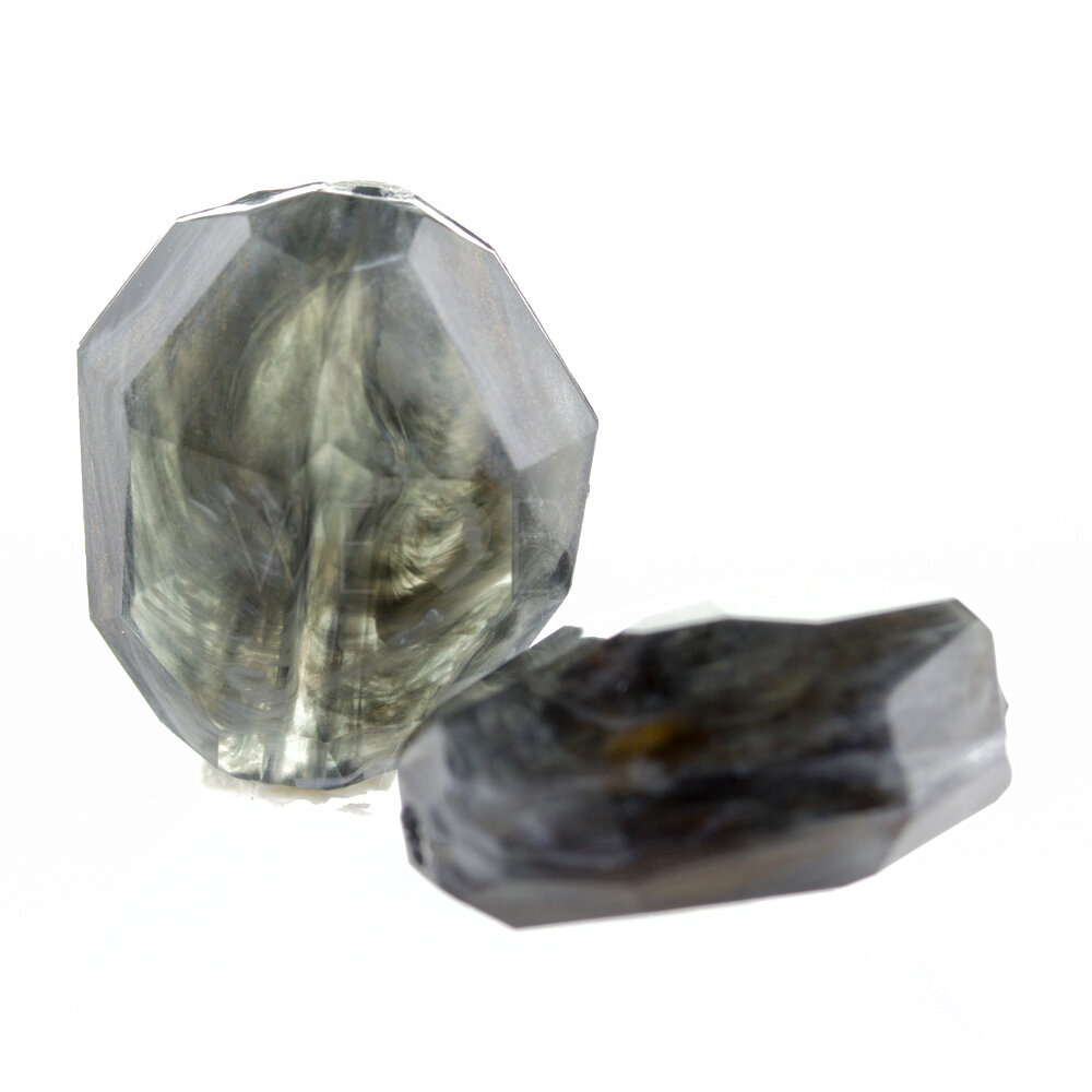 25x21 oval Perle in rabenschwarz mit goldschleier